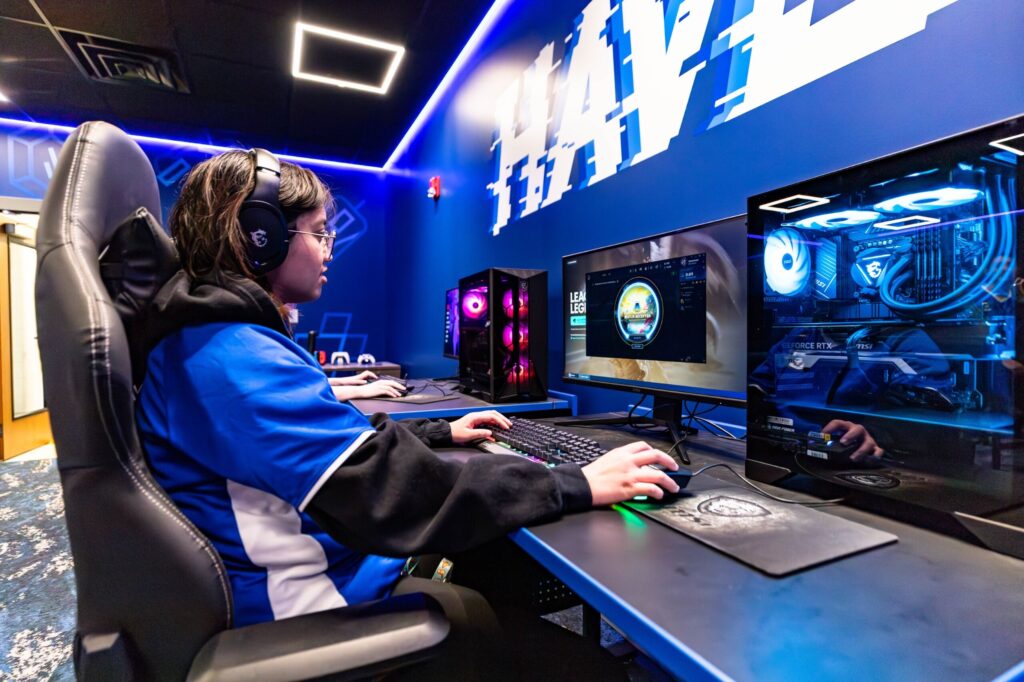 A student plays a game on a computer.