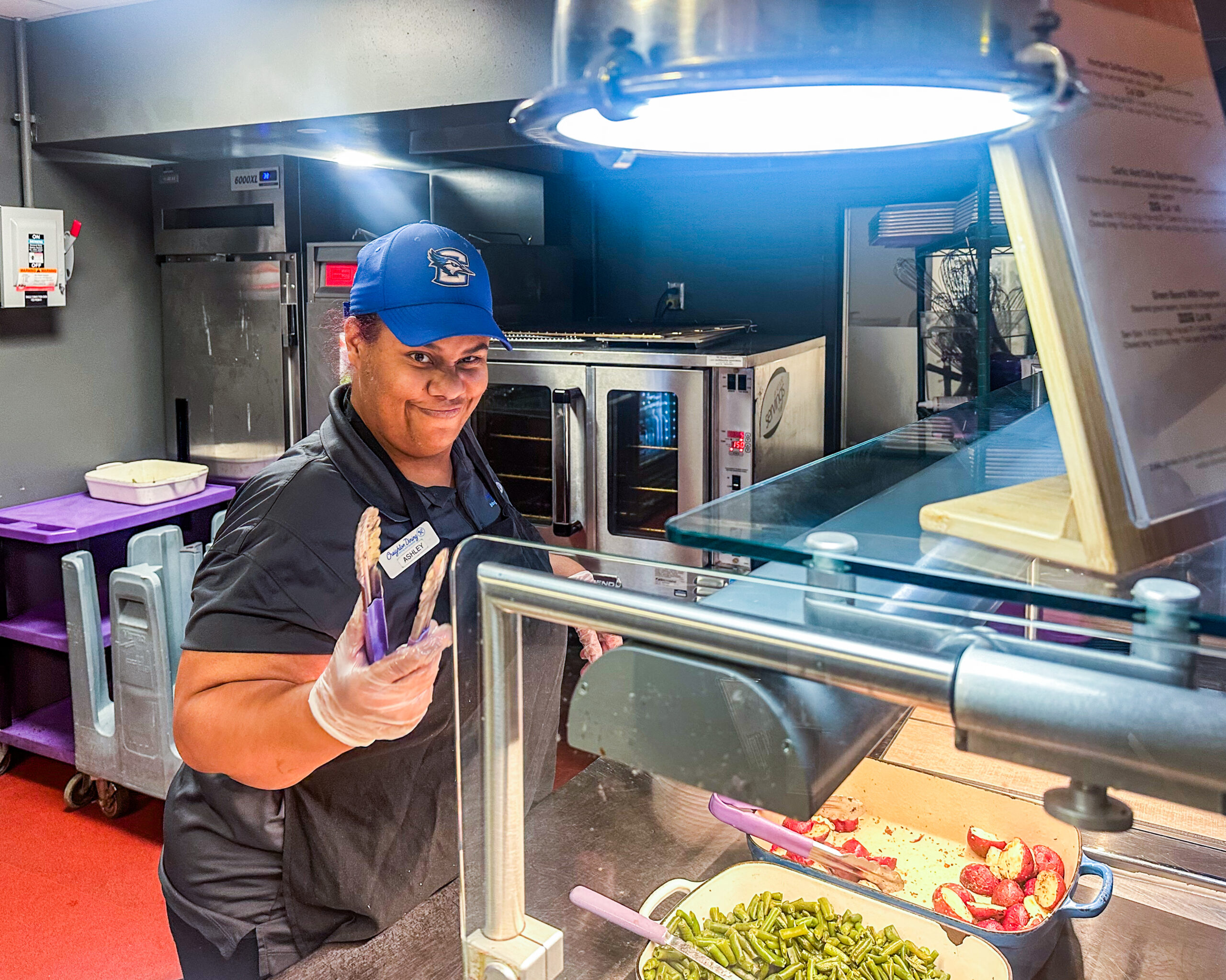 Ashley Venon, known for bringing smiles to the Creighton community, encourages students to be happy and have fun whenever they can.