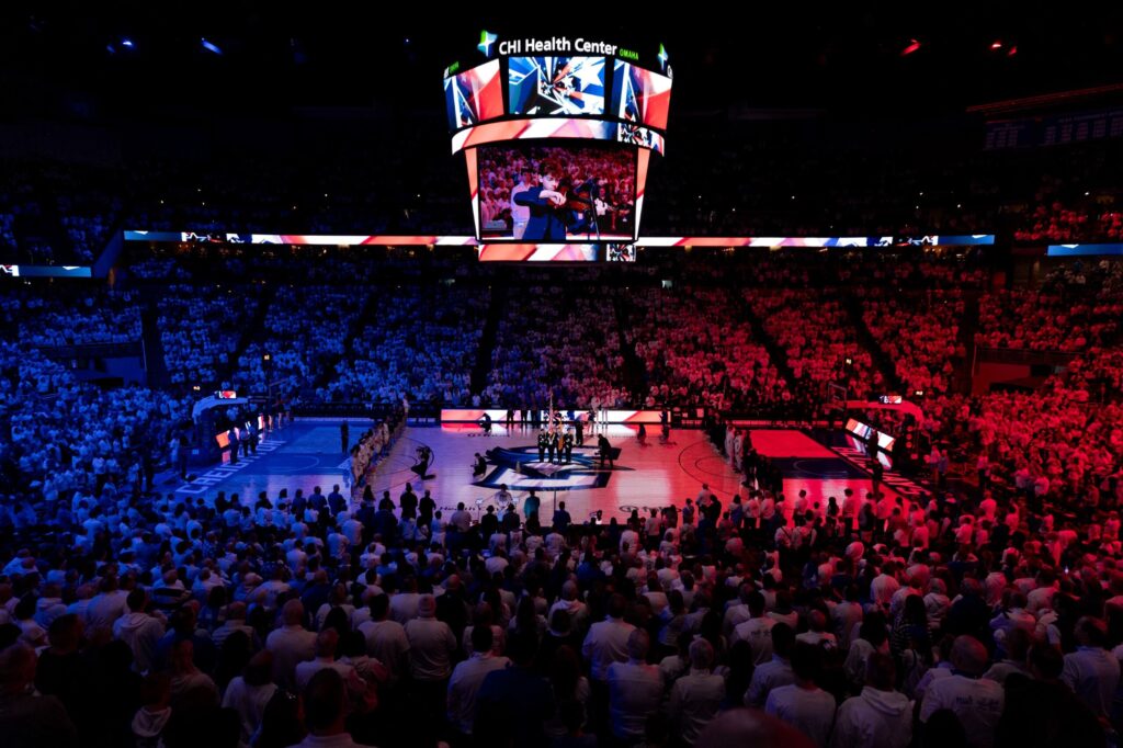 A full stadium of basketball fans