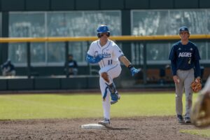 Junior infielder Ben North celebrates getting onto base in the team's opening series at Charles Schwab Field.