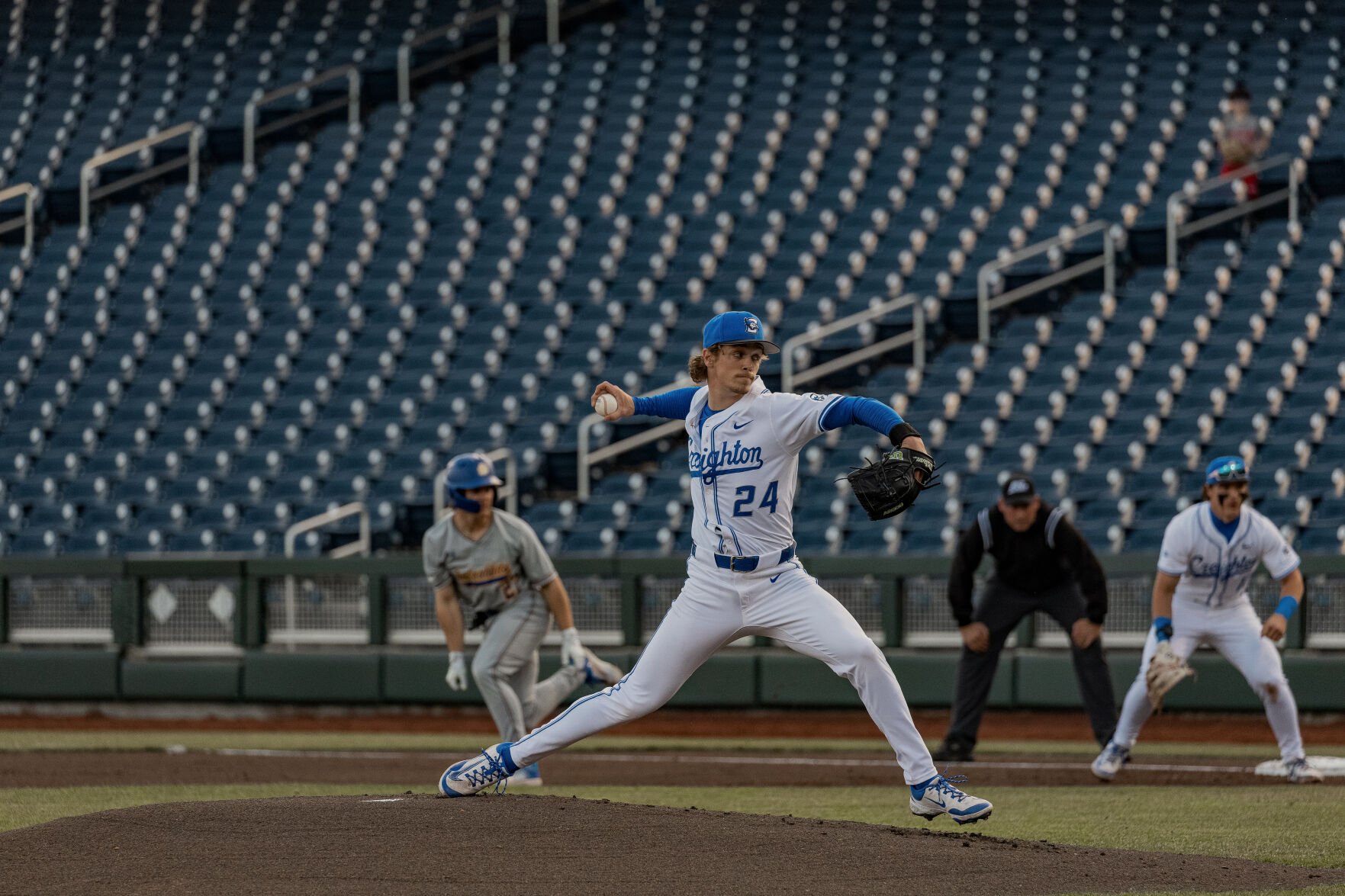 Junior pitcher Ian Koosman, leans forward, preparing to finish out his pitch in Crieghton's battle with South Dakota.