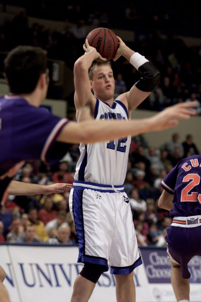 Former Creighton basketball player Alan Huss shoots the ball