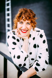 Addie Barnhart is shown, as an Addie Barnhart is an actress, director and associate professor of theatre at Creighton University.