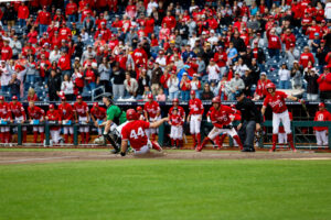 Nebraska's Gabe Swanson slides into home plate in the Huskers' 7-3 win over Oregon.
