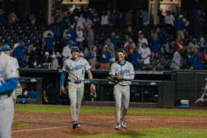 Teddy Deters and Tate Gillen walk with big smiles after upsetting Kanasas.