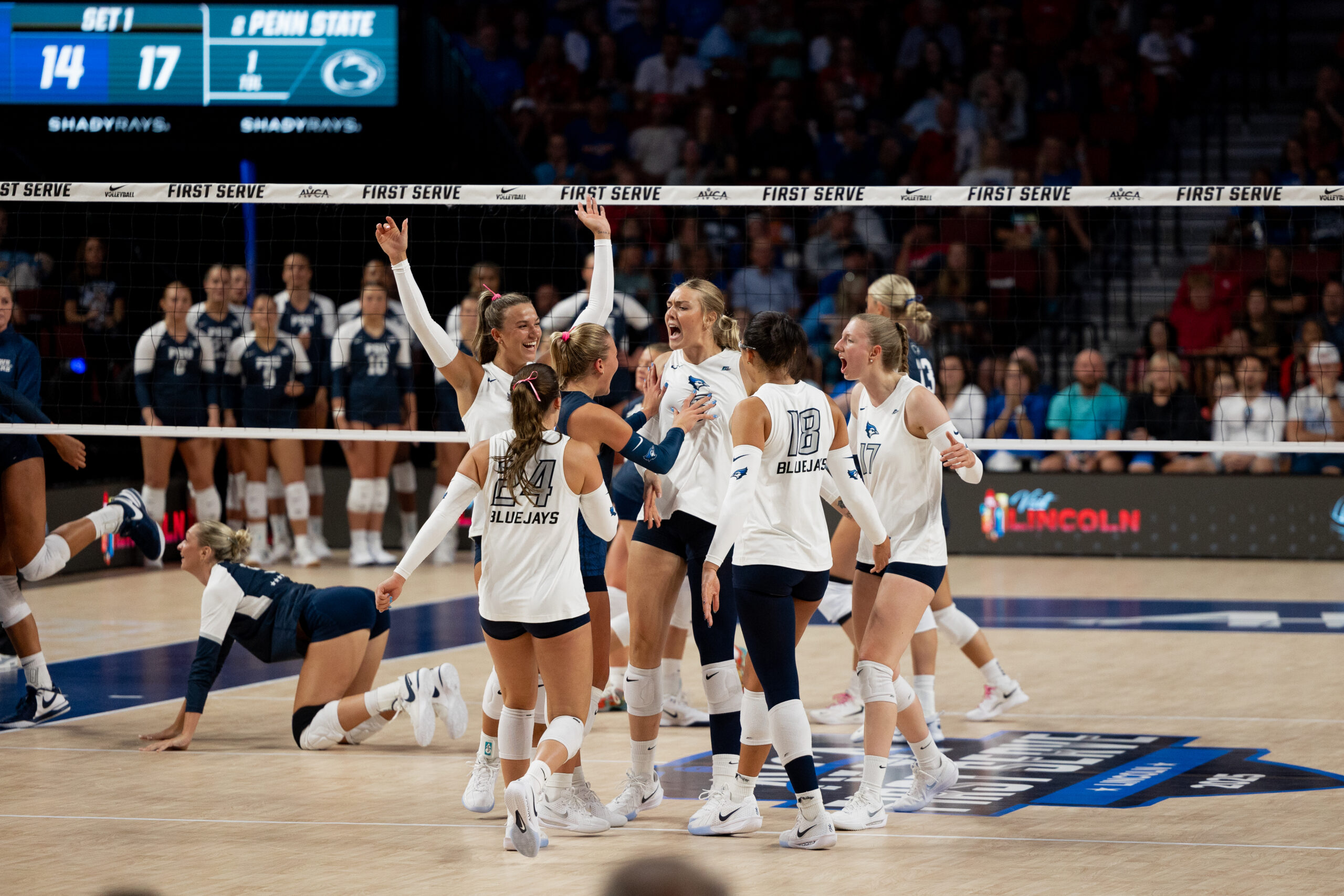 Volleyball celebrates after a monster block from Kiara Reinhardt.